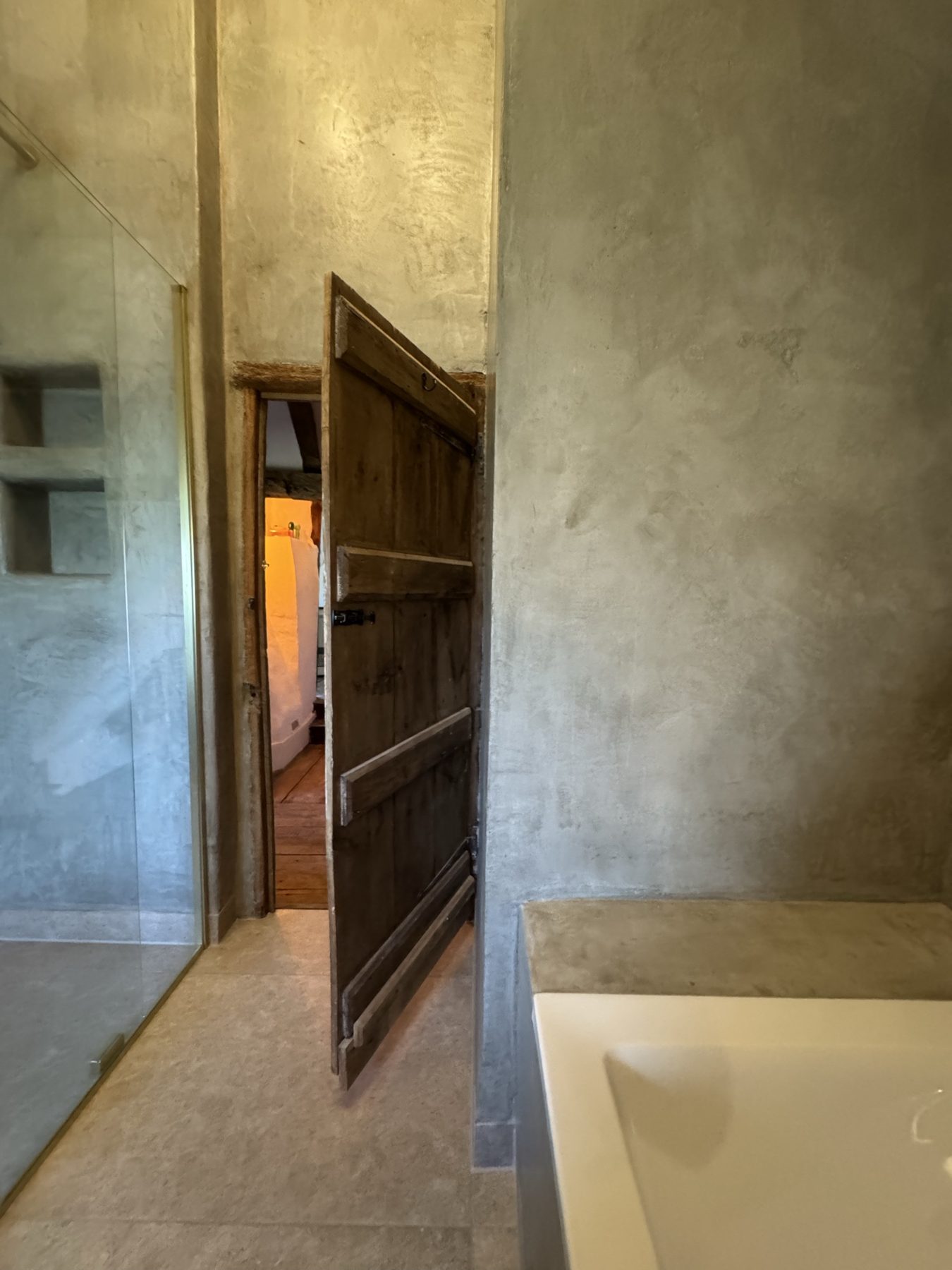 Old oak plank door in the farmhouse bathroom – Bramble Farmhouse bathroom renovation, Wye, Kent