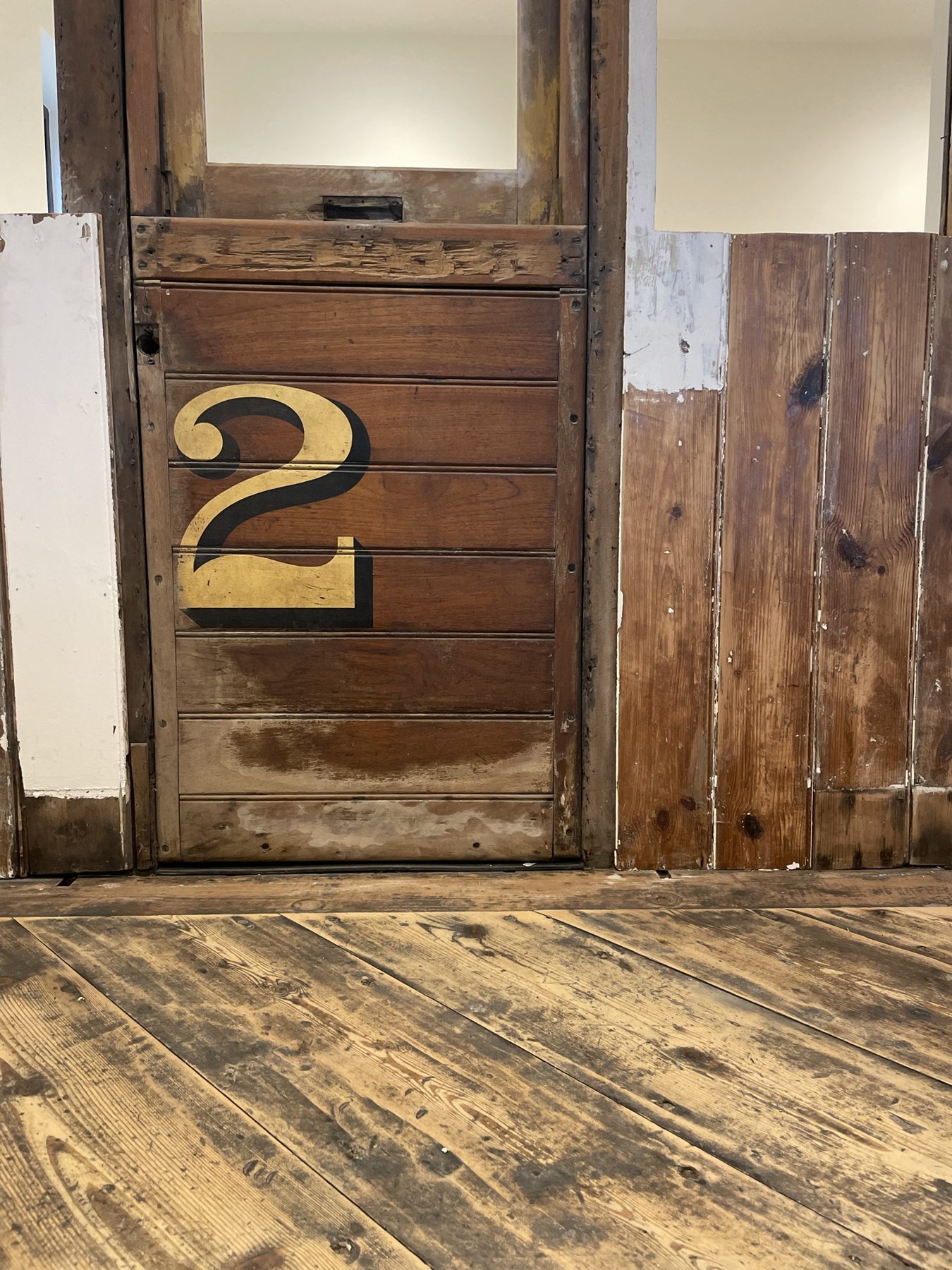 Reclaimed door and worn oak floor – USFEW, Kent