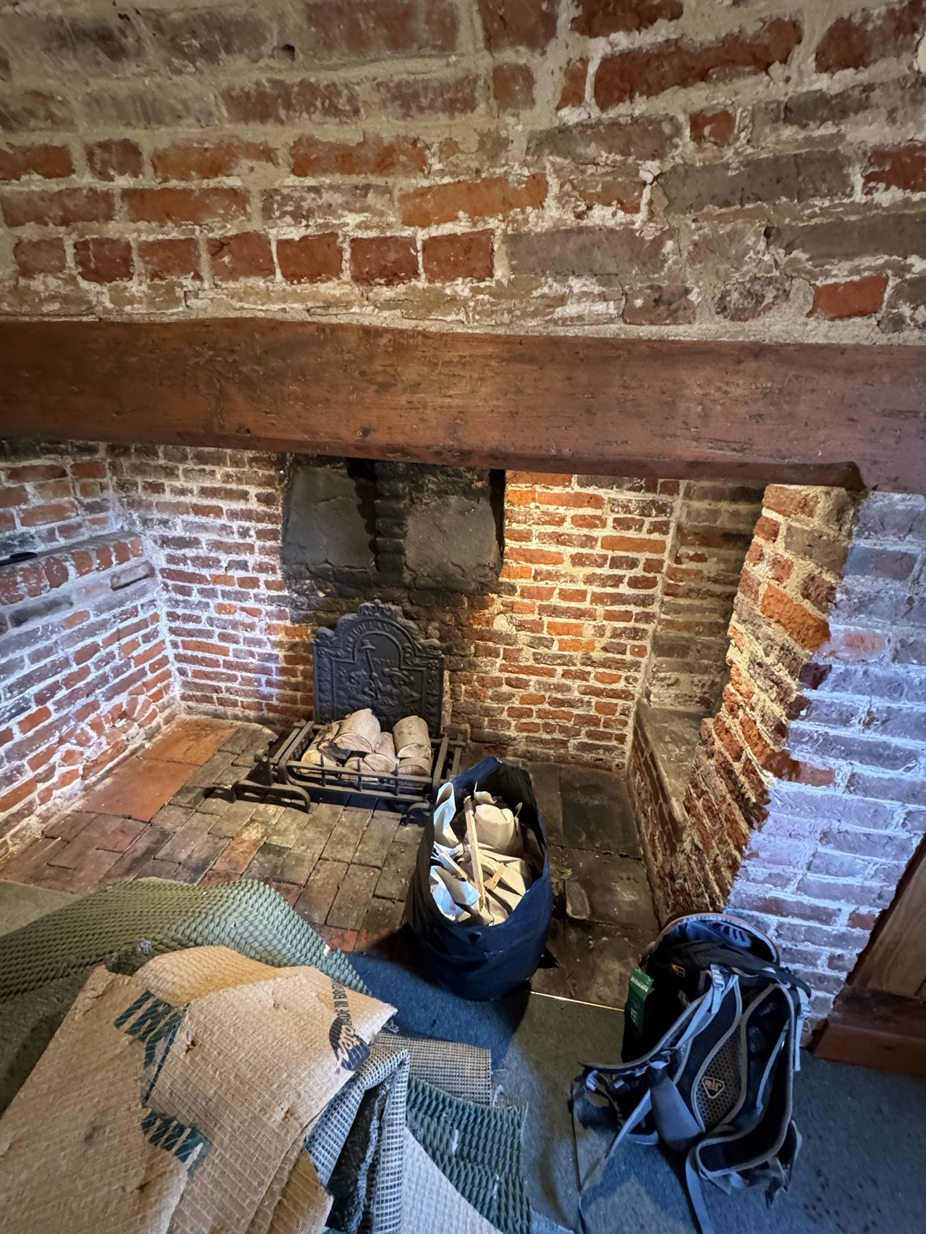 Brick inglenook fireplace being restored – USFEW, Kent